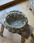 small round rattan basket with handle