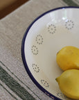 low white enamel bowl with flower detail