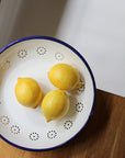 low white enamel bowl with flower detail