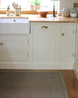 looped sisal rug with olive green cotton border
