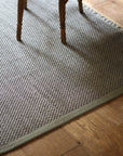 looped sisal rug with olive green cotton border