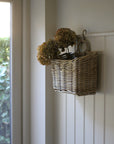 rattan basket with loop to hang on a hook