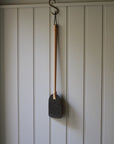 wood and leather fly swat