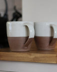 terracotta mug with white glaze top detail available in small and large