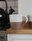 terracotta mug with white glaze top detail available in small and large