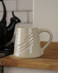 stoneware mug with etched detail