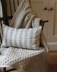 aran wool blanket in flecked oat colour, made in ireland