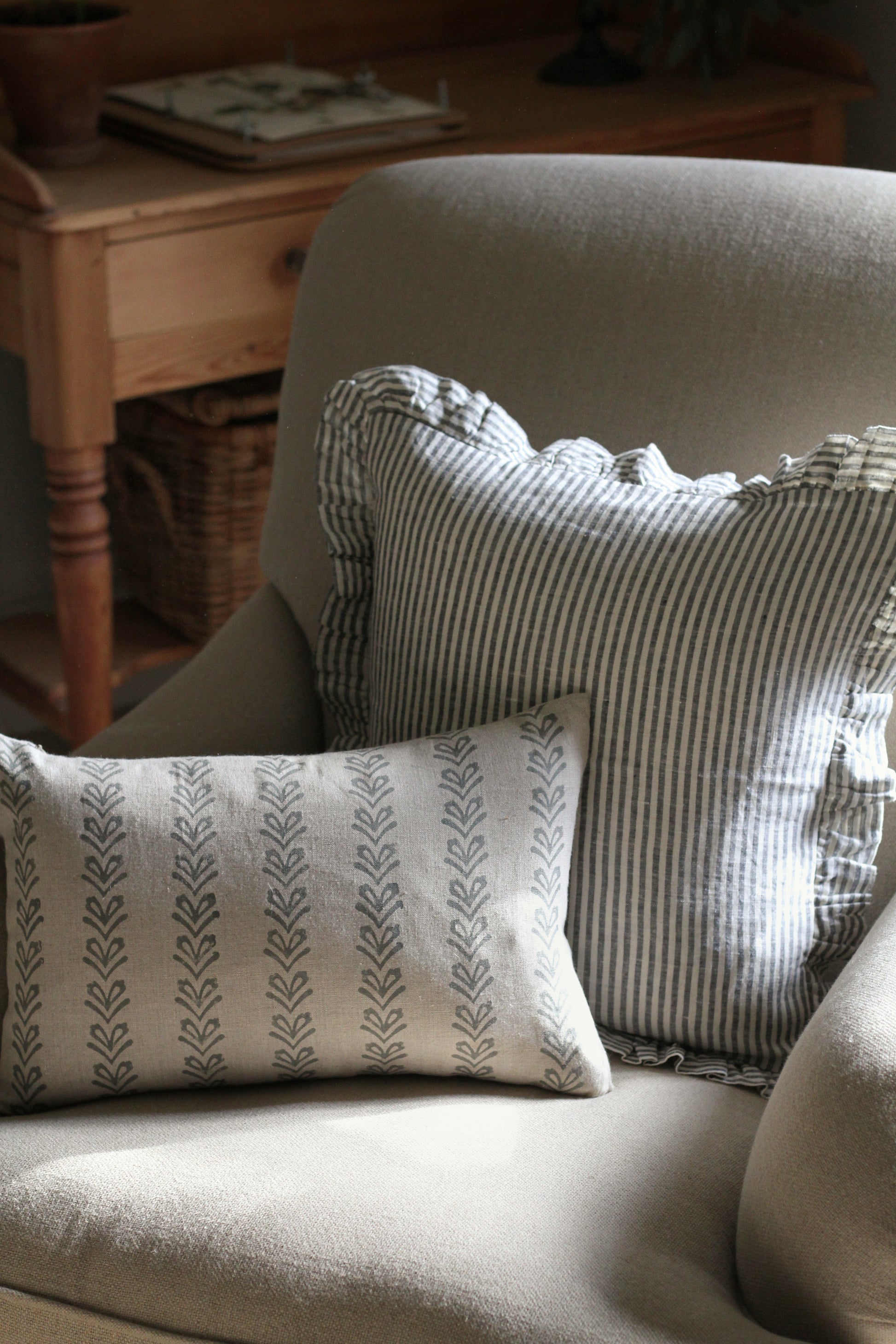 frilled linen cushion available in natural and thin black stripe line, comes with duck feather inner