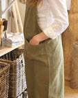 olive green linen cross back apron