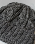 aran merino wool hat with a diamond stitch in charcoal grey