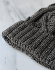 aran merino wool hat with a diamond stitch in charcoal grey