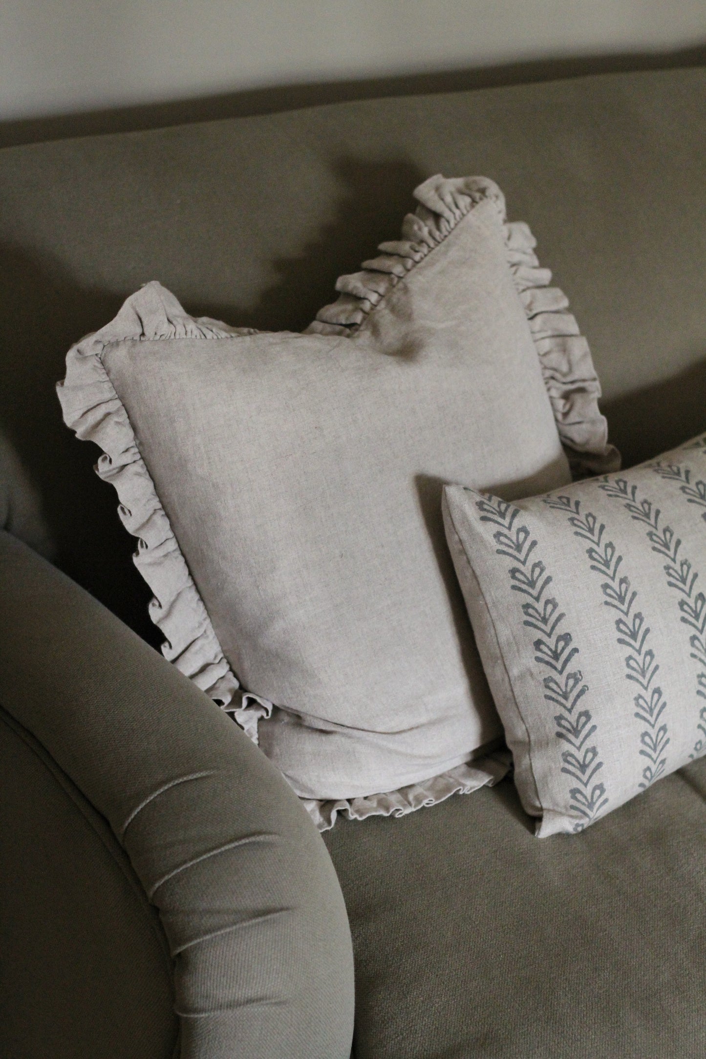 frilled linen cushion available in natural and thin black stripe line, comes with duck feather inner
