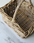 small grey wash rattan basket with handle