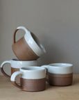 terradotta mug handmade with a white glaze rim
