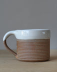 terradotta mug handmade with a white glaze rim