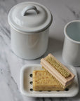 white enamel metal soap dish and drip tray