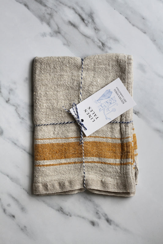 rustic linen tea towel natural linen colour with a mustard yellow stripe