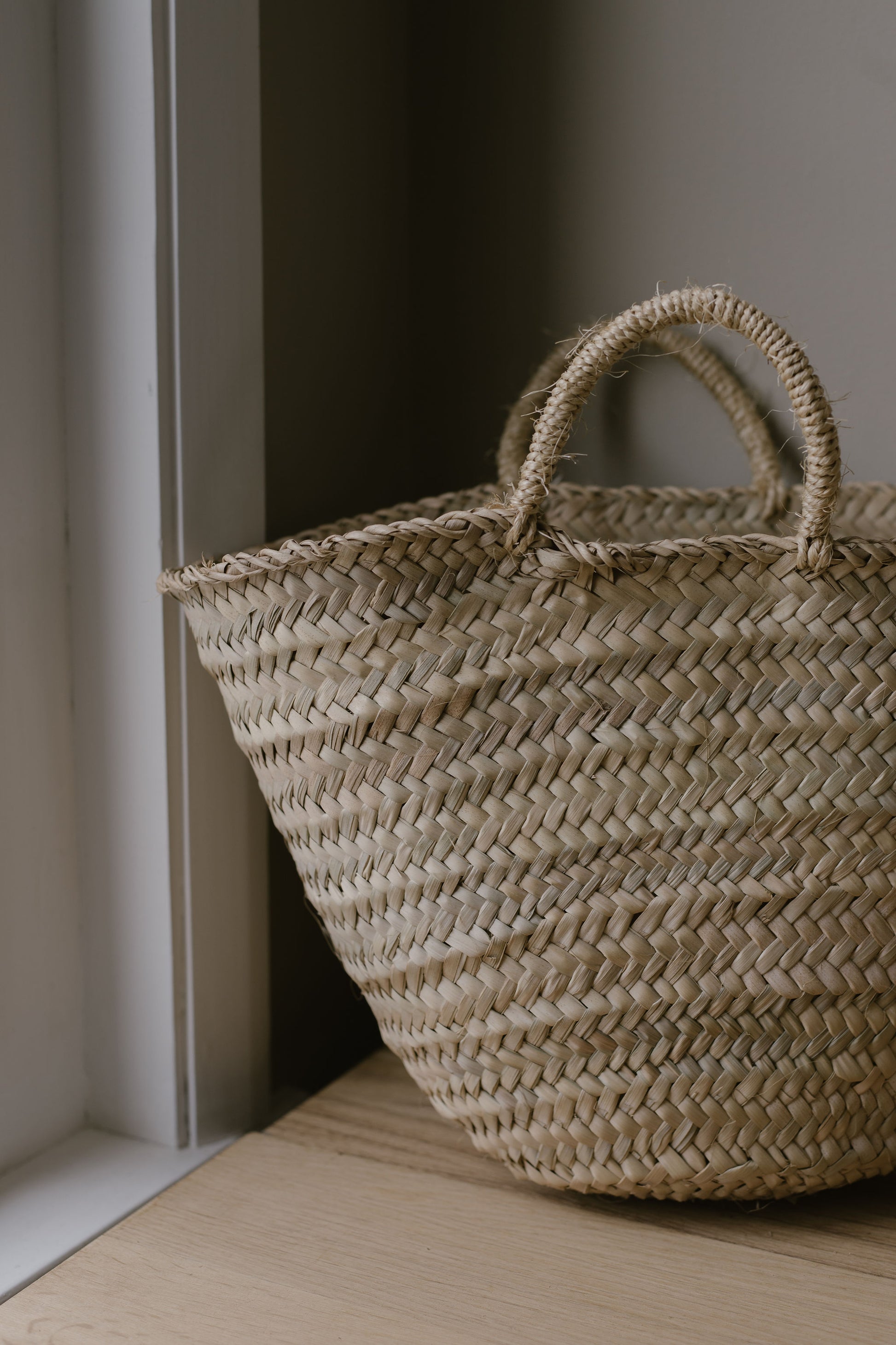 small palm leaf basket with handles 