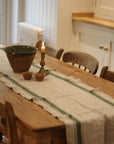 Rustic linen table runner in beige with a french style green stripe