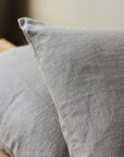 100% linen cushion with feather inner available in olive and natural