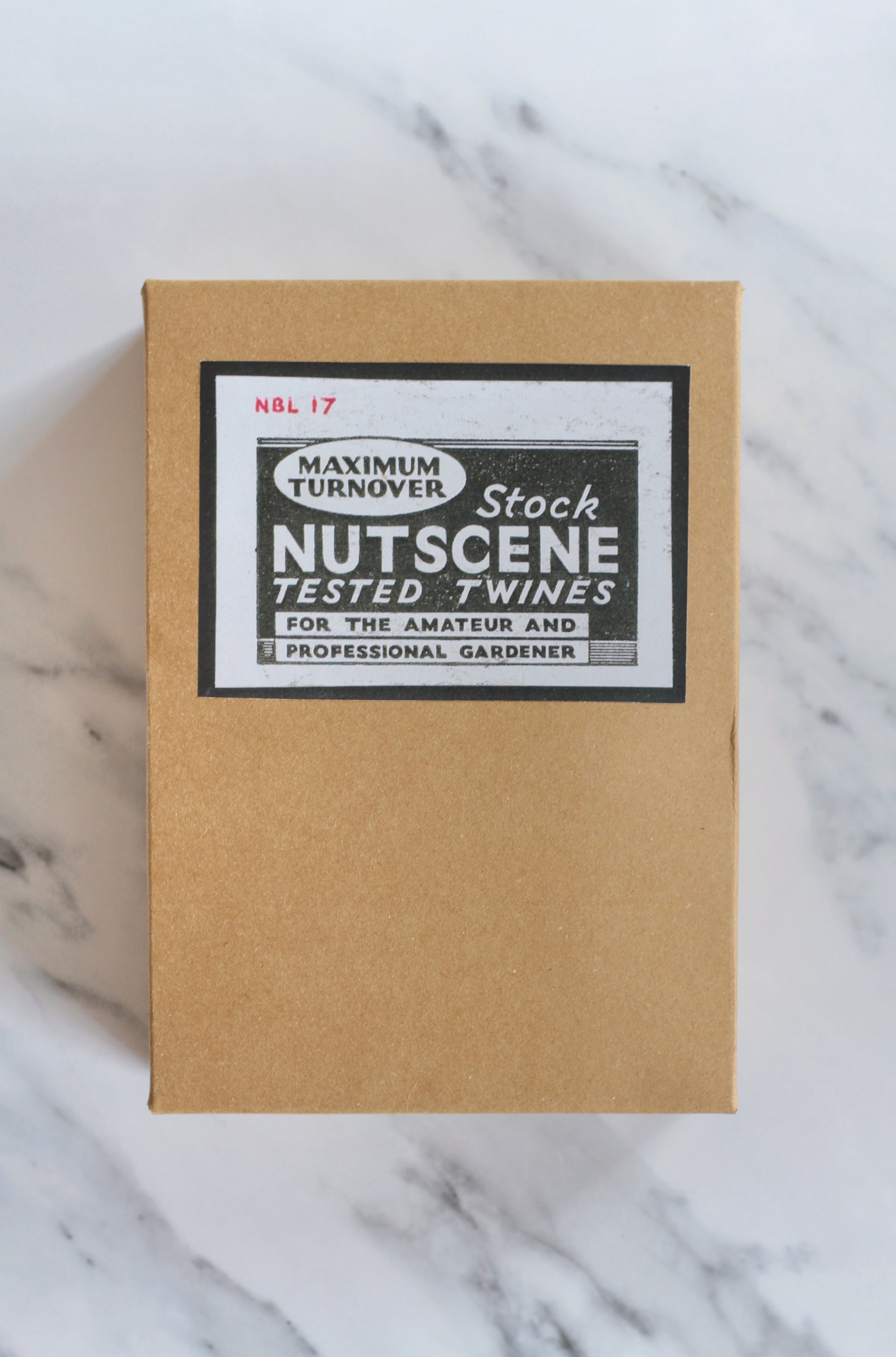 nutscene gardeners gift box with garden scissors and two twine balls, wooden seed labels packaged in a vintage style kraft box