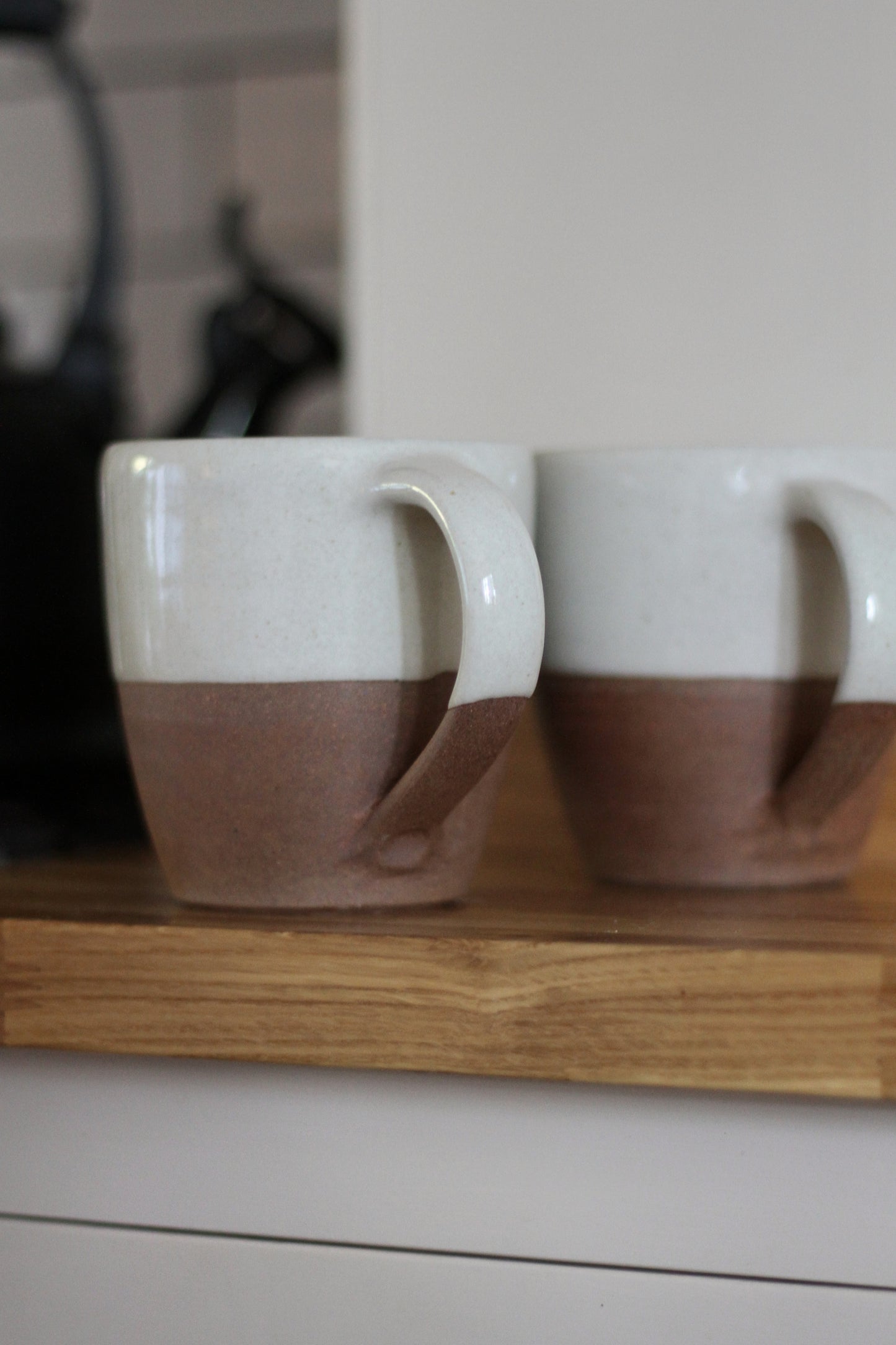 terracotta mug with white glaze top detail available in small and large 