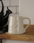 stoneware mug with etched detail