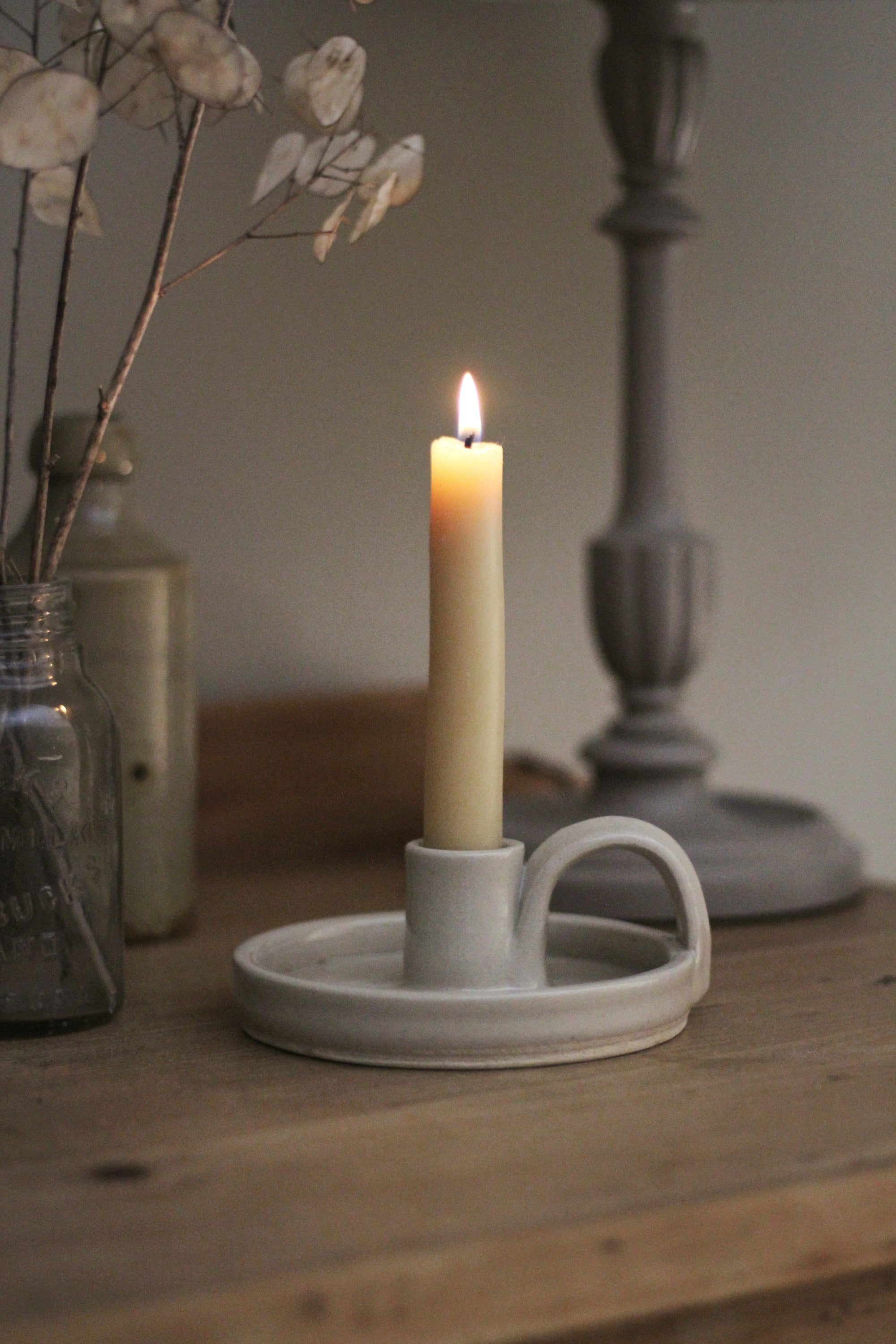 glossy poff white stonware candle holder with handle, handmade in uk 