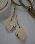 handmade pair of ceramic mitten tree decoration off white 