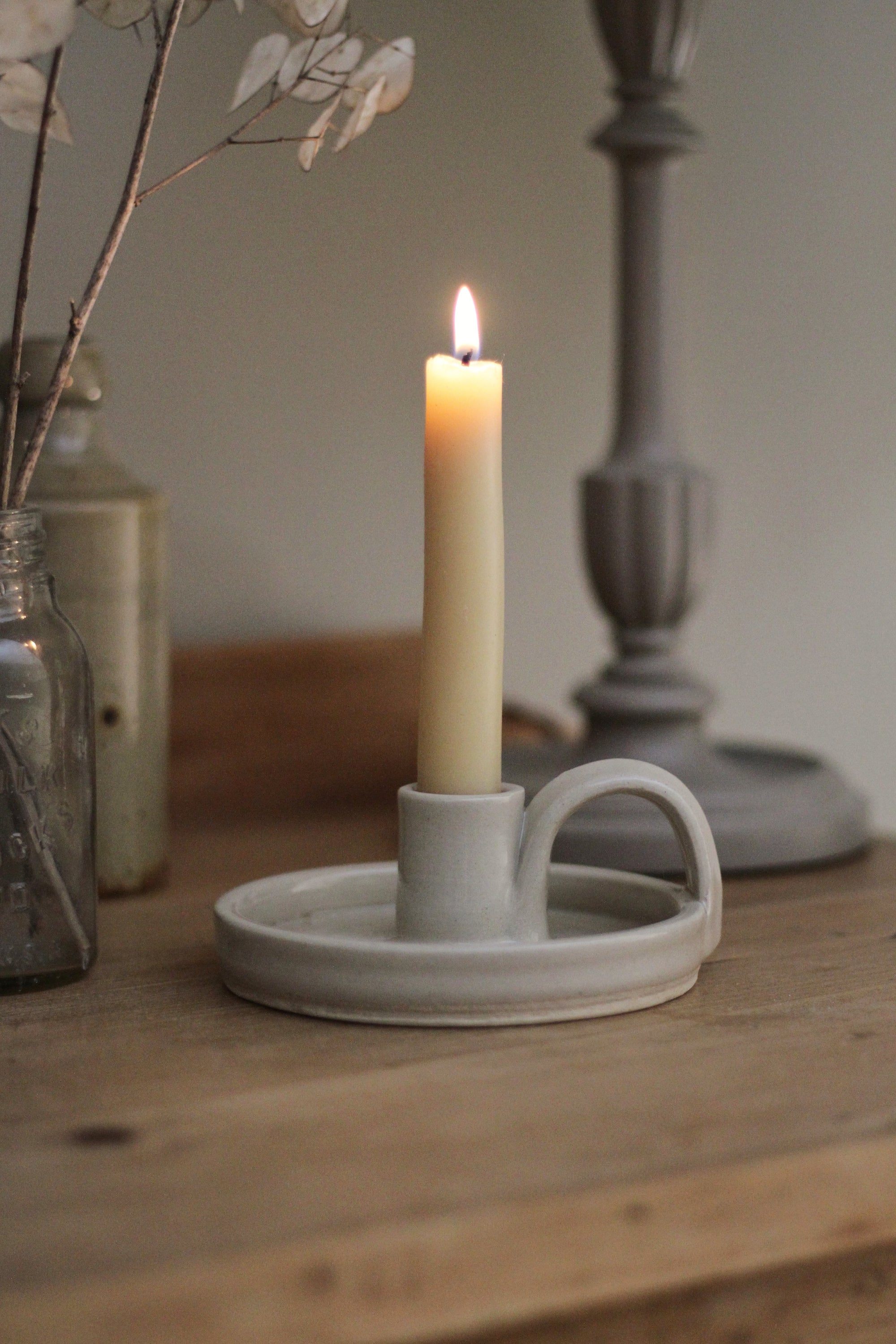 glossy poff white stonware candle holder with handle, handmade in uk 