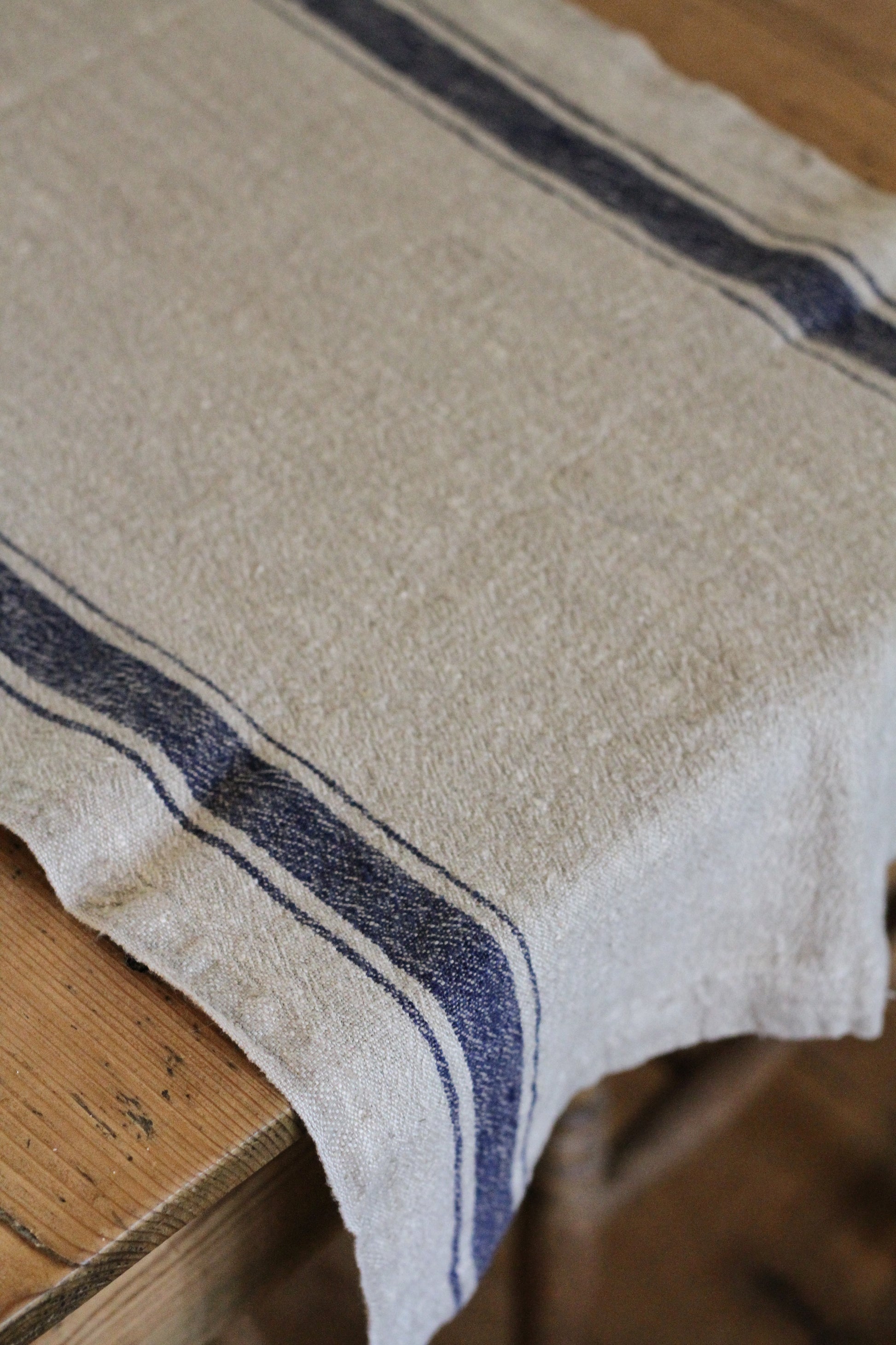 rustic linen table runner with blue stripe 