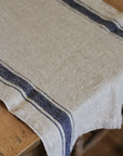 rustic linen table runner with blue stripe 