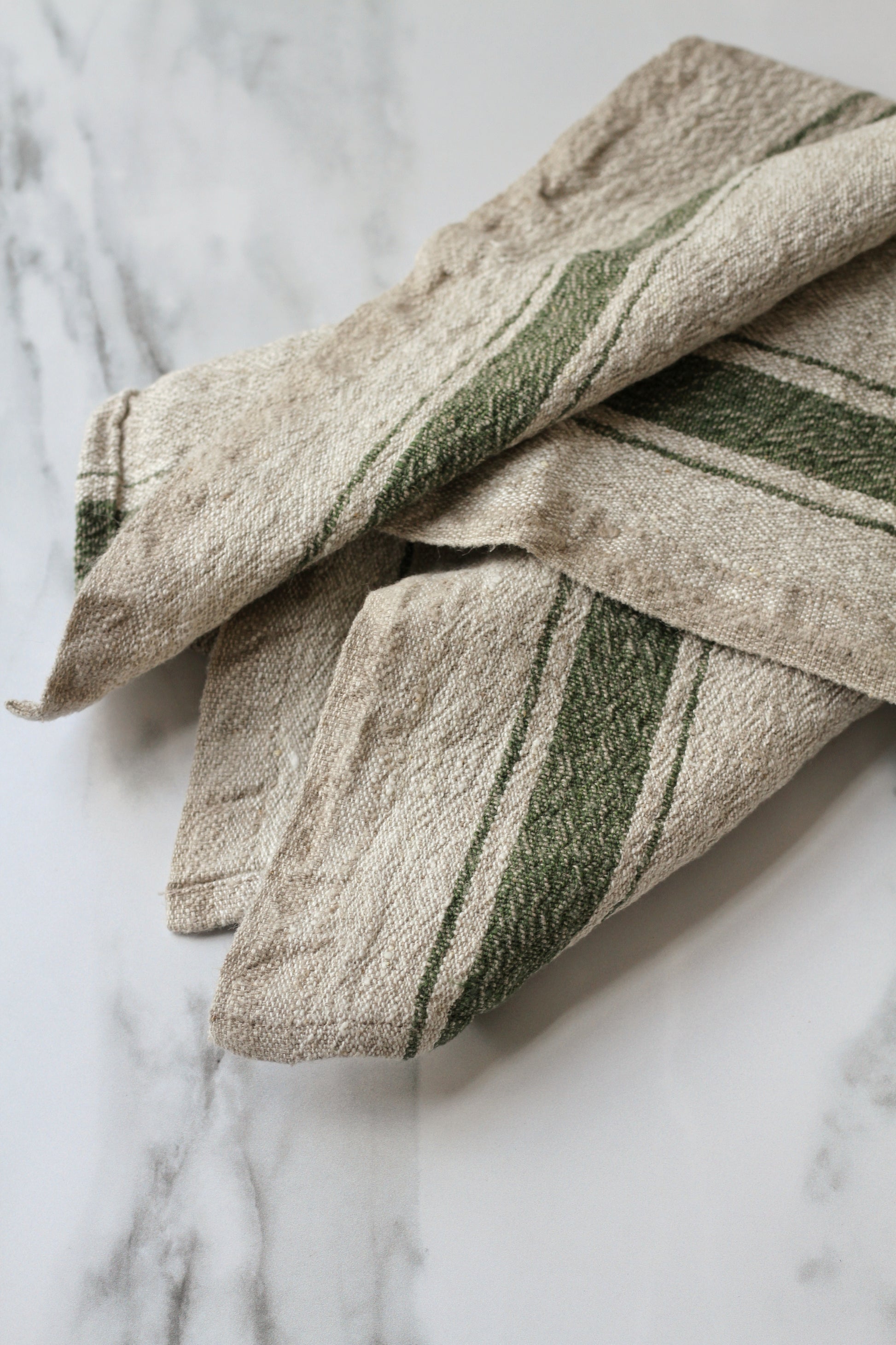 set of two linen napkins with a green stripe, french style.