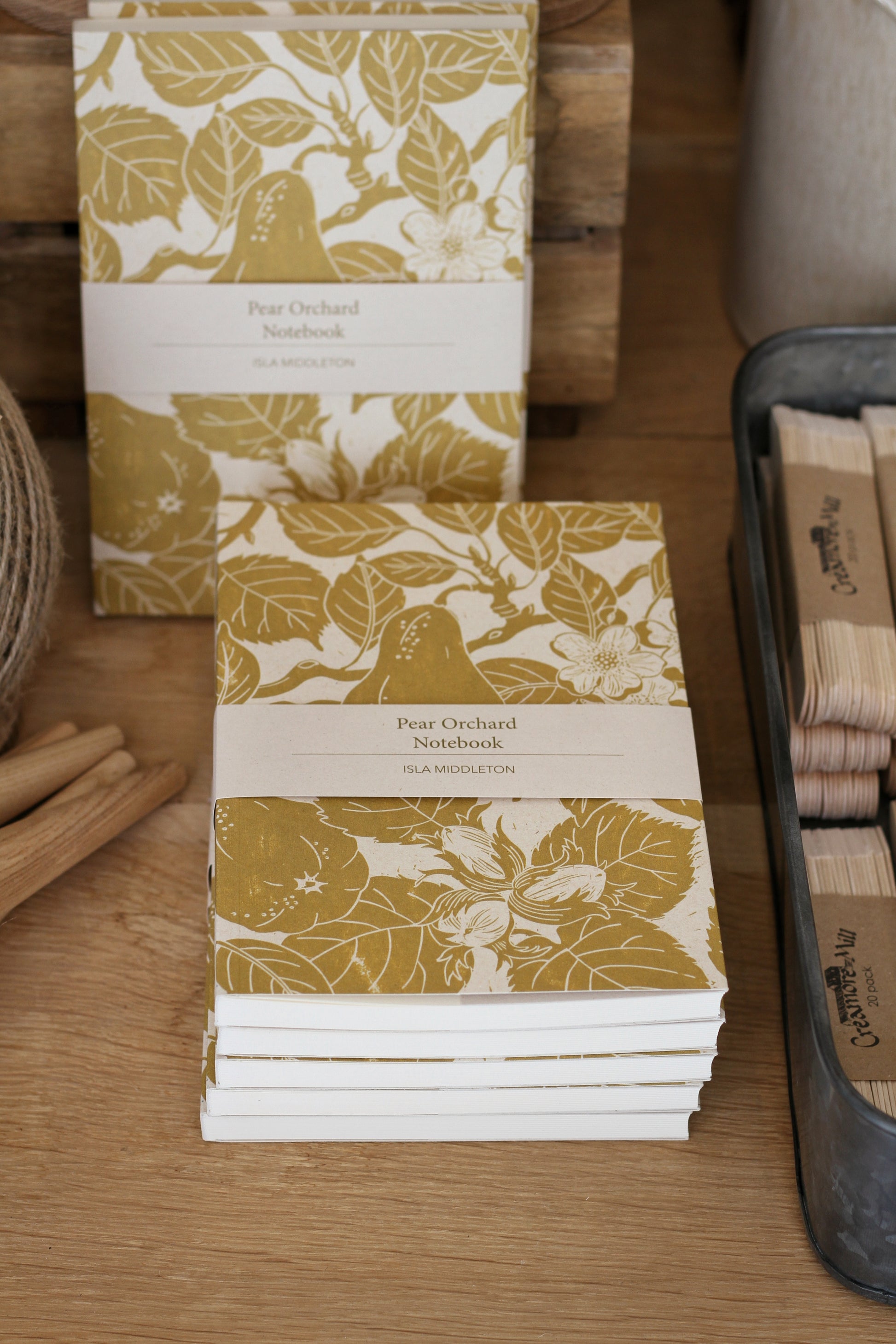 isla middleton notebook qrinted from an original lino print of pears colour is ochre