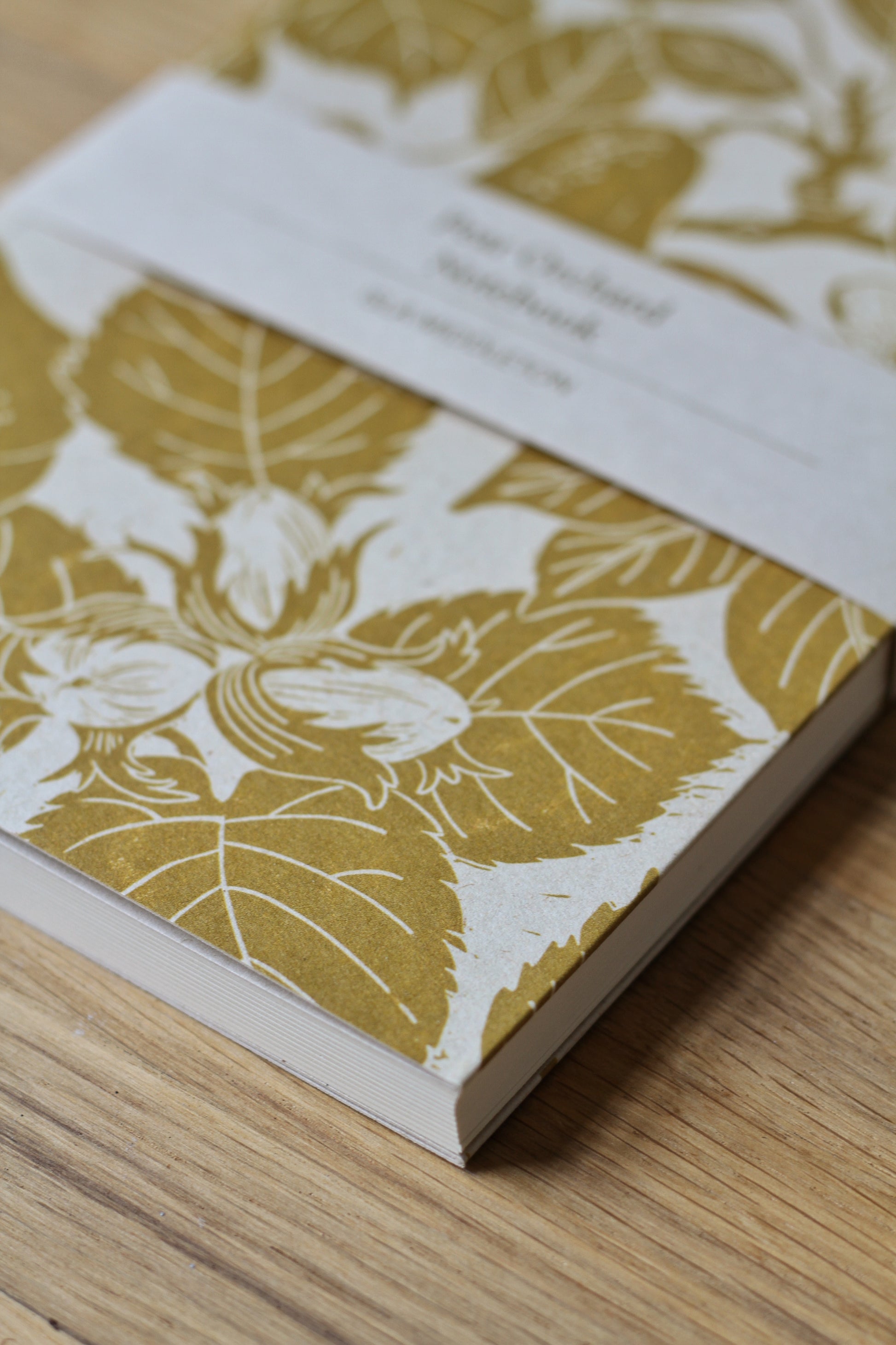 isla middleton notebook qrinted from an original lino print of pears colour is ochre 
