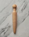 wooden plant dibber for making a hole in the soil
