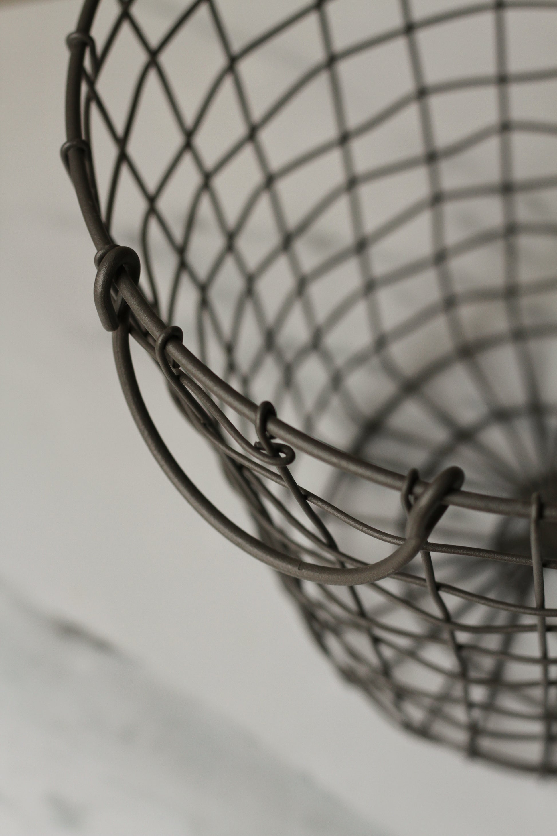 black round wire metal basket with handles