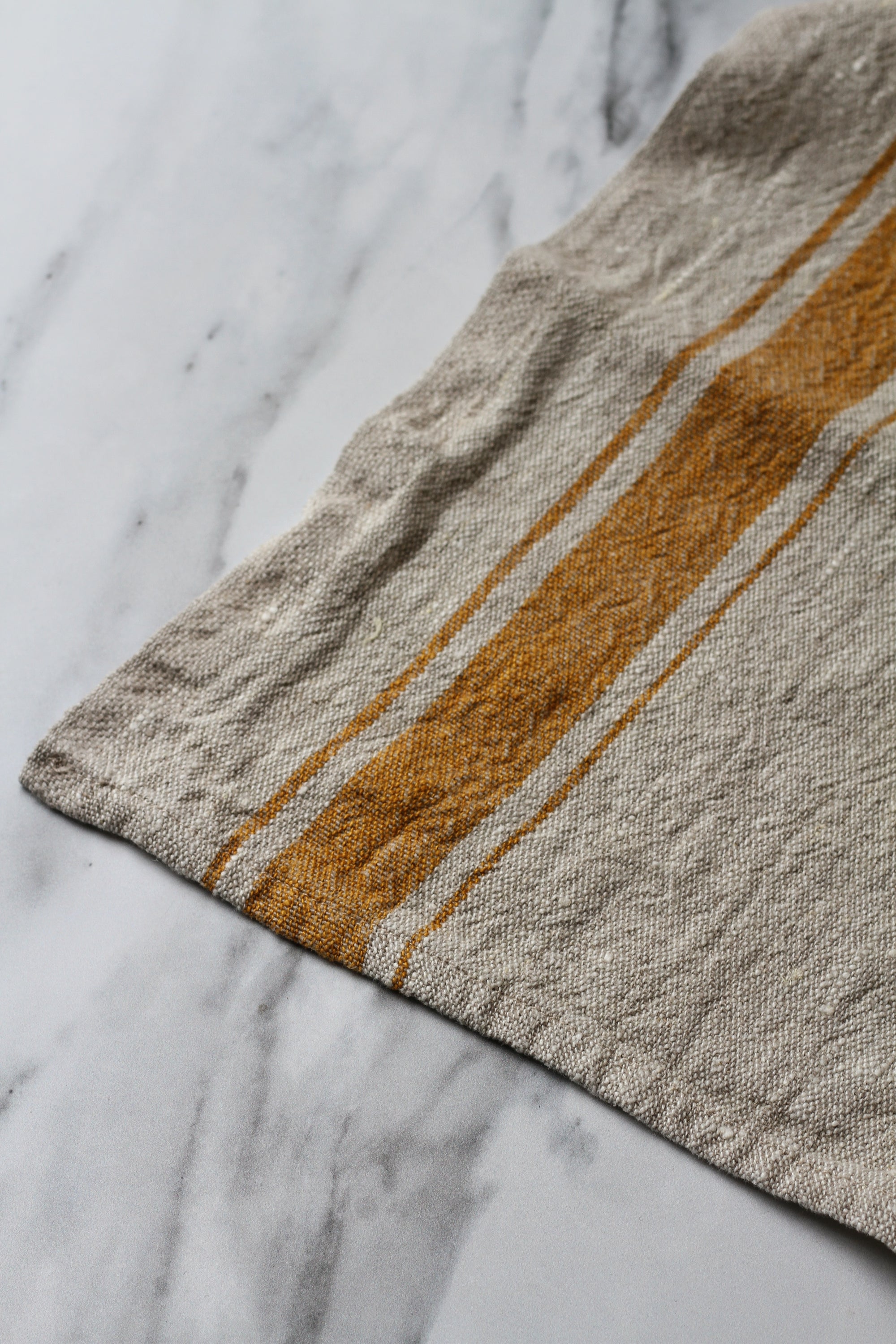 rustic linen tea towel natural linen colour with a mustard yellow stripe