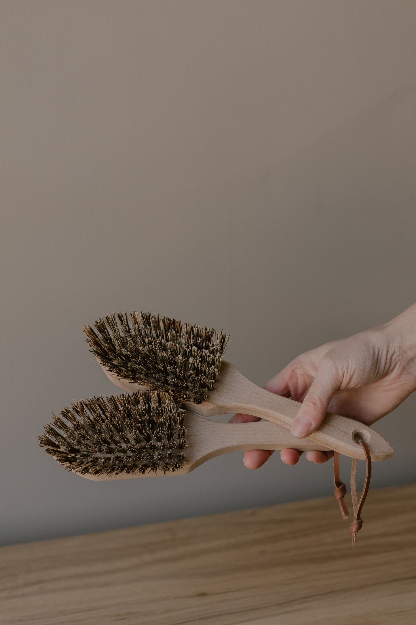 wooden scrubbing brush with a pointed edge