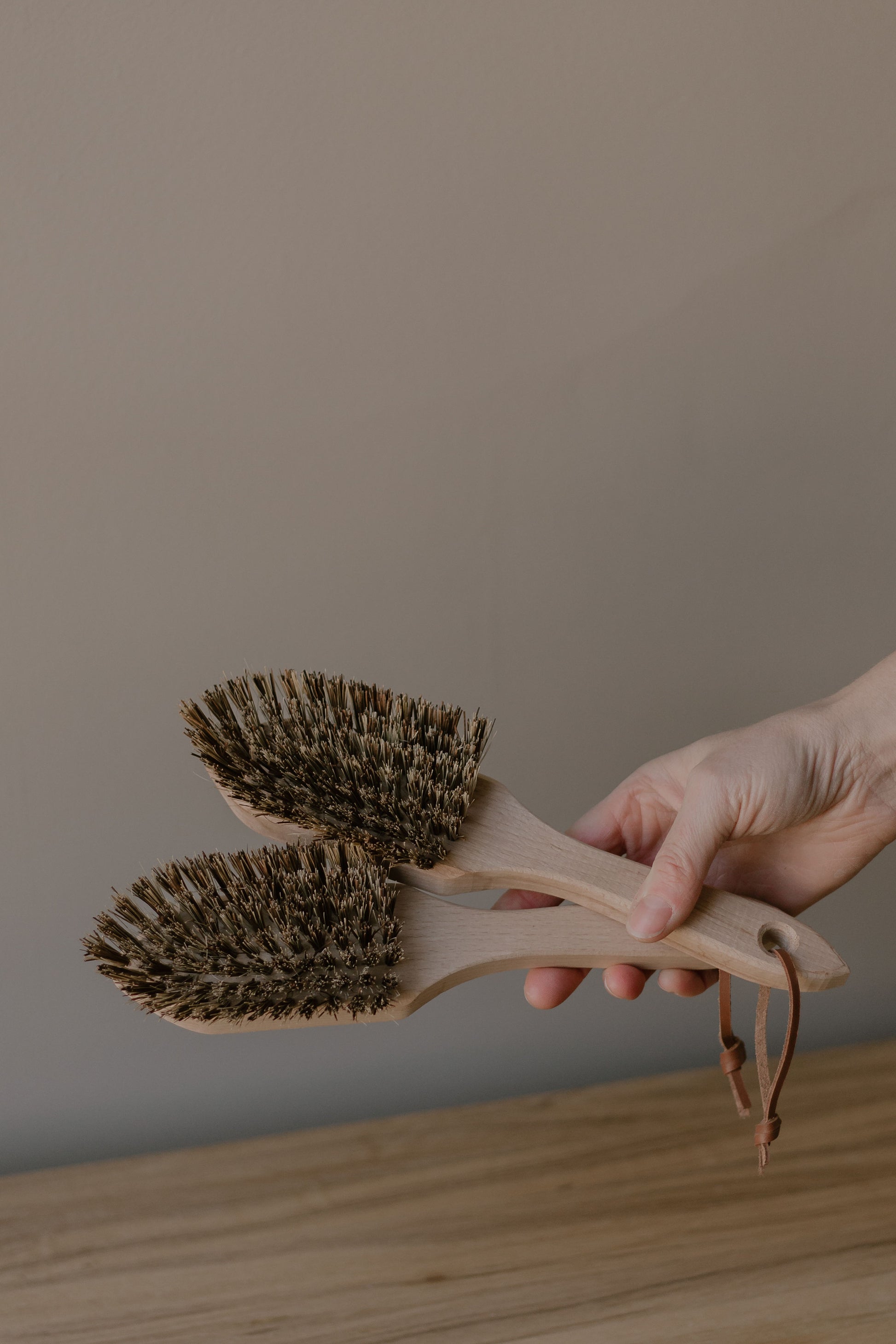 wooden scrubbing brush with a pointed edge