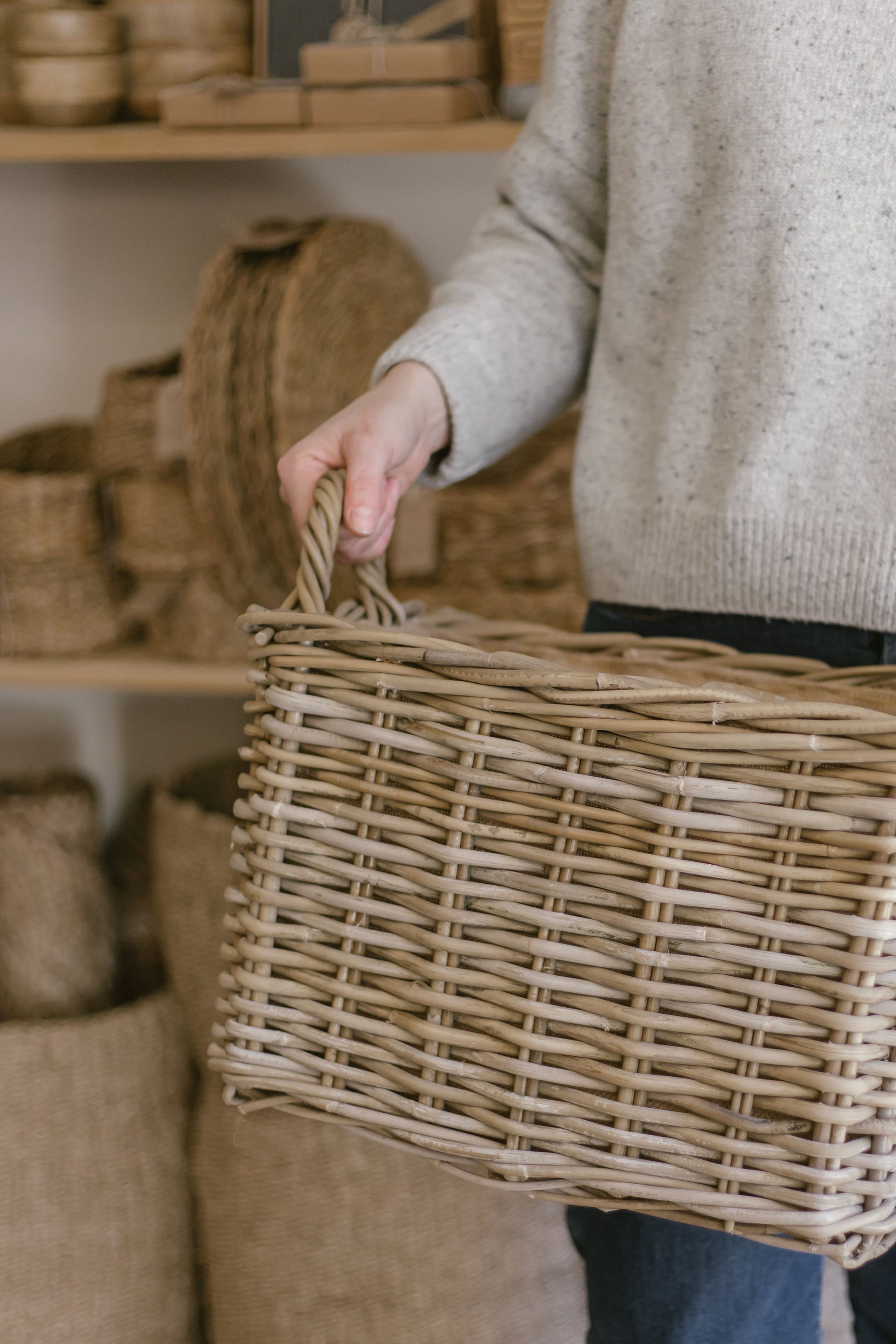 rattan basket with jute liner and handles