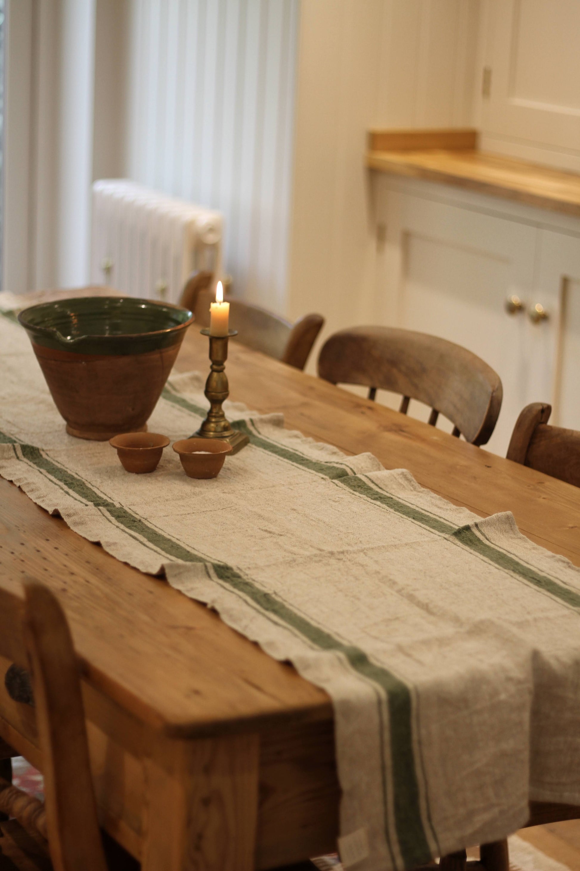 Rustic linen table runner in beige with a french style green stripe