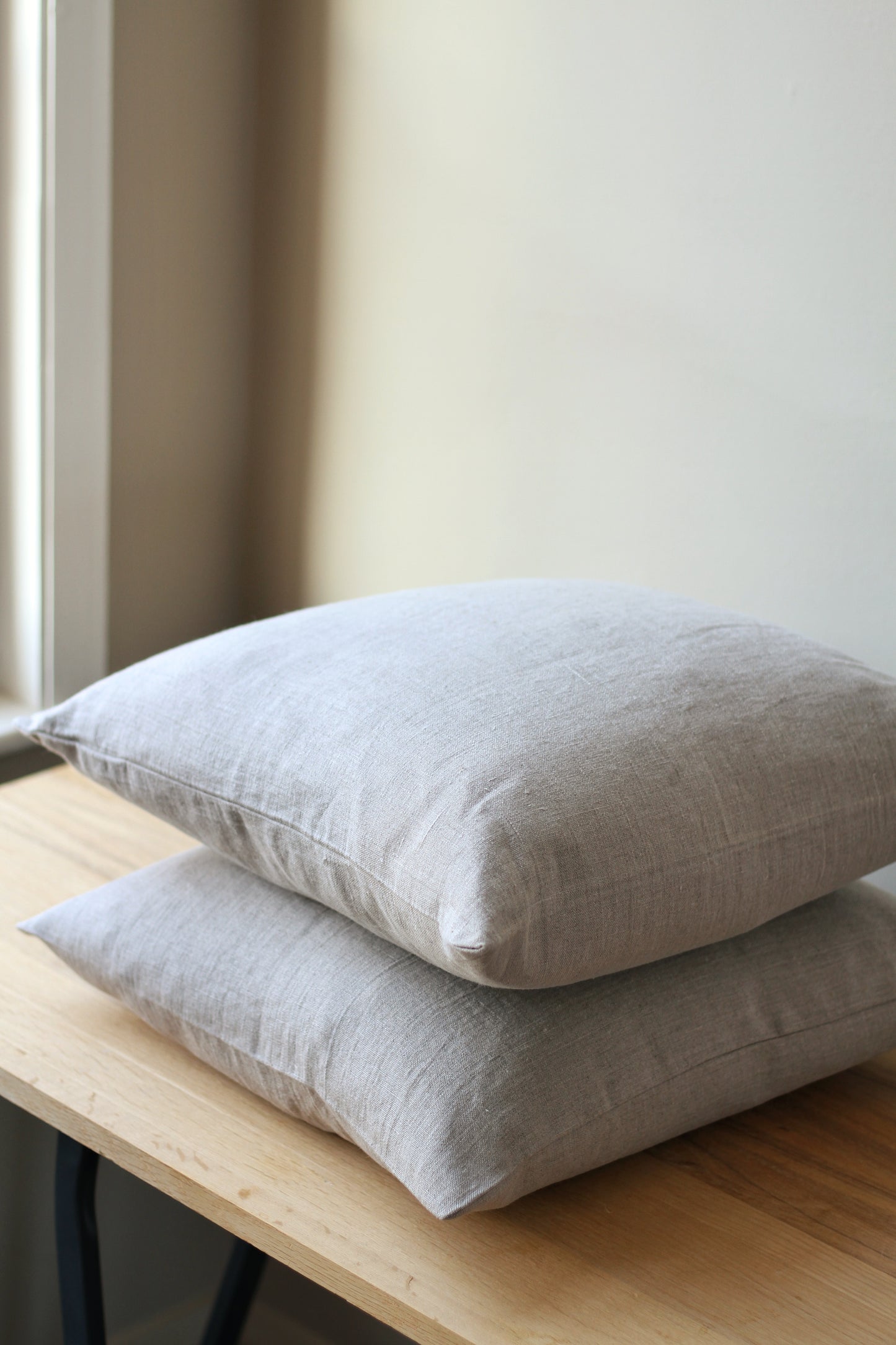 100% linen cushion with feather inner available in olive and natural