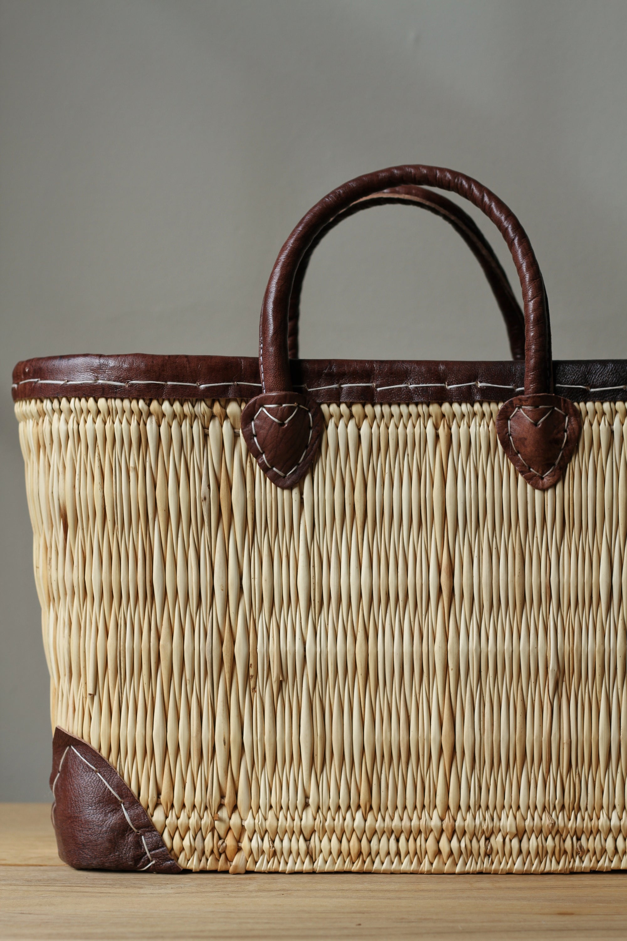 palm leaf box shopping bag with dark leather trim