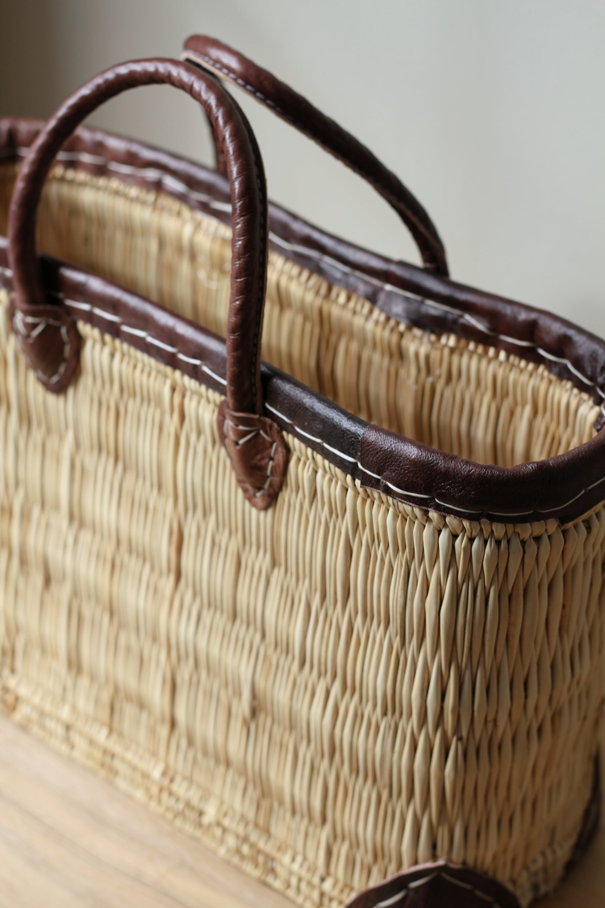 palm leaf box shopping bag with dark leather trim